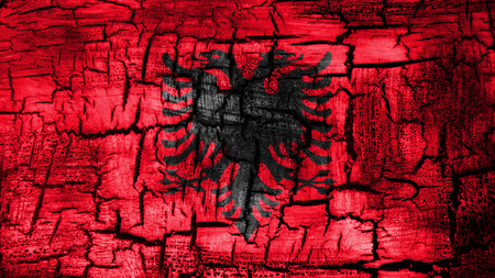 Flag of Albania, Albanian flag painted on cracked groundの写真素材