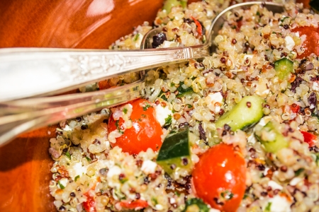 Mediterranean quinoa salad with tomatoes and feta cheese close upの写真素材