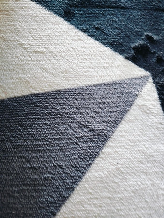Abstract textured background A close up of a black and white abstract rug, carpet backround