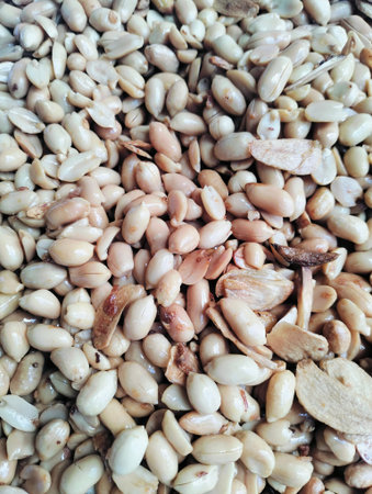 Roasted peanuts mixed with garlic as a traditional savory snack with crunchy texture and natural...