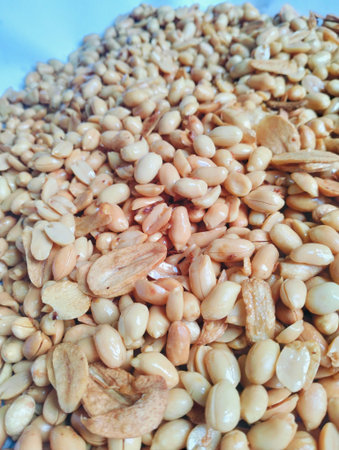 Roasted peanuts mixed with garlic as a traditional savory snack with crunchy texture and natural...