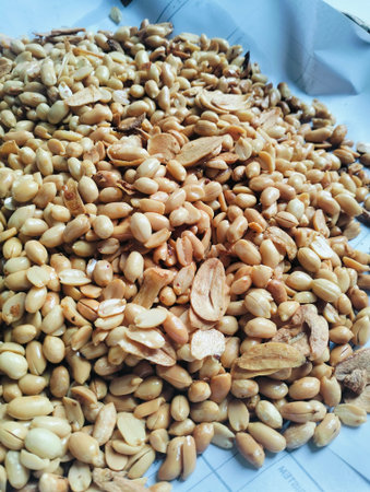 Roasted peanuts mixed with garlic as a traditional savory snack with crunchy texture and natural...