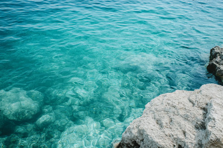 Vibrant photography of crystal clear blue water capturing nature s serenity and beautyの素材