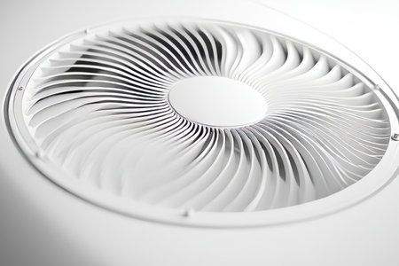 Modern air conditioning unit with fan for efficient cooling of outdoor residential areasの写真素材