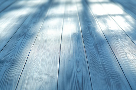 Soft light blue wooden floor with sun rays and shadows minimalist abstract interior design shotの写真素材