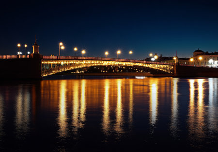 Nighttime view of stpetersburg s illuminated drawbridge open over the river in summerの写真素材