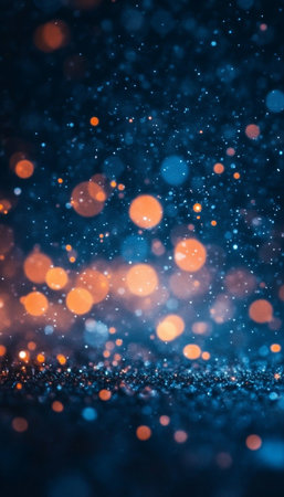 Abstract blurred bokeh lights in orange and blue on dark background for festive celebrationsの写真素材