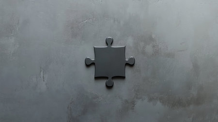Jigsaw puzzle piece on gray background symbolizing business success and integration strategyの写真素材