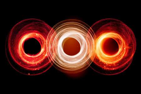 Vibrant abstract circles with glowing lights on black background evoking aurora borealis atmosphereの写真素材