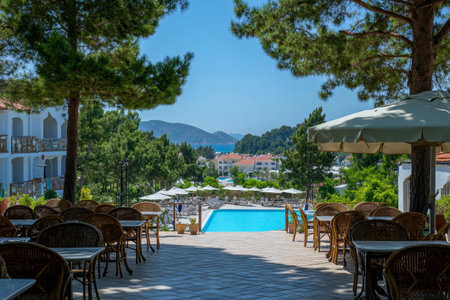 Charming outdoor cafe with scenic views of nature and relaxing ambianceの写真素材