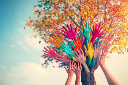 Illustration of philanthropy colorful hands and tree symbolizing community and charity valuesの写真素材