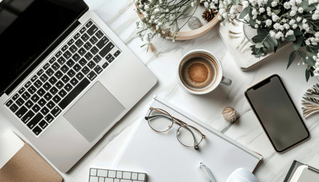 Minimal workspace mock up with laptop, smartphone, and decorations in high quality cropped shot