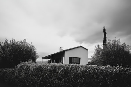 Stunning modern architecture of a contemporary Italian home surrounded by scenic landscapesの写真素材