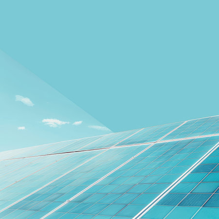 Wide solar panel landscape under clear blue sky, ideal for ample text placement opportunities