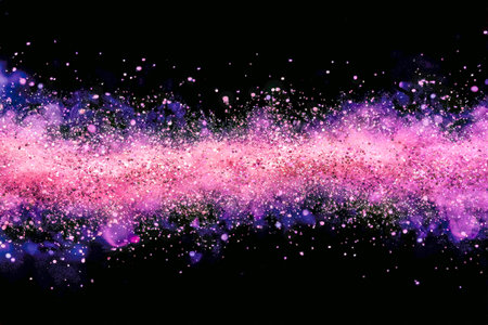 A vibrant burst of shimmering pink and violet powder erupts against a dark backdrop, creating a mesmerizing explosion of color and dynamic energy.の写真素材