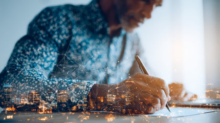 A professional figure studies a vibrant cityscape illuminated with a complex digital grid, embodying data-driven decision making in urban development.の写真素材