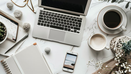 Minimal workspace mock up with laptop and smartphone in high quality cropped shotの写真素材