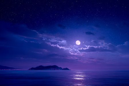 A serene nighttime seascape with reflective waters under a luminous moon, twinkling stars adorn the sky, and a distant island silhouettes on the horizの写真素材