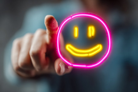 A person presents a vibrant, glowing yellow facial symbol with a bright pink border, creating a...