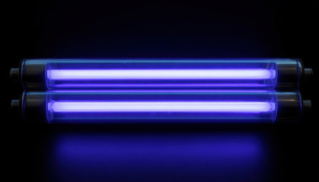 A high-tech ultraviolet disinfection device casts a mysterious violet glow in a shadowy space, highlighting its role in sterilization and sanitation.の写真素材