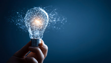 A person's hand gently cradles a glowing, high-tech bulb emitting bright, futuristic light,...