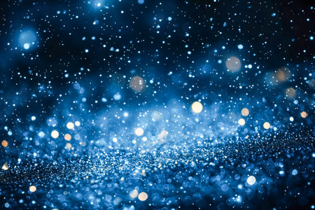 Twinkling azure orbs drift across a shadowy backdrop, evoking a mystical and energetic ambiance suitable for technology, fantasy, or celebration themeの写真素材