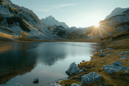 Beautiful sunset at zittauerhuette mountain lake, wildgerlossee, salzburg, austria, europeの写真素材