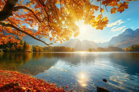 Stunning autumn sunset reflection at hintersee lake in Berchtesgaden national parkの写真素材