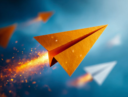 Bright orange paper crafts streak across a vivid blue backdrop, leaving fiery trails that evoke...
