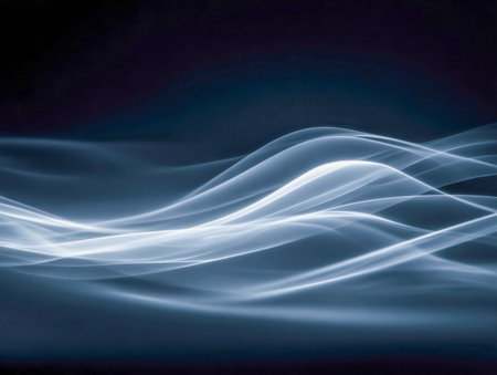Elegant white light ribbons swirl seamlessly across a deep blue backdrop, evoking a dynamic sense of...