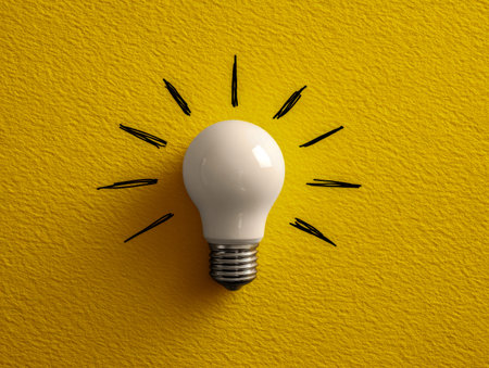 A luminous white bulb paired with bold, sketchy rays on a textured yellow backdrop, highlighting...
