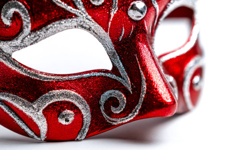 Intricate crimson and platinum adornment featuring glimmering accents, exuding elegance and mystique, perfect for masquerade events or artistic displays.の写真素材