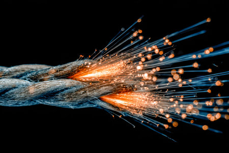 A dynamic macro shot capturing vibrant sparks and luminous streaks emanating from a fiber optic...