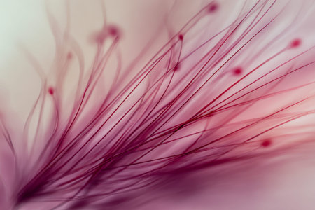 Windswept strands of pastel-colored fibers shimmer softly, blending into an abstract, glowing tapestry that evokes serenity and delicate beauty in natural harmony.の写真素材