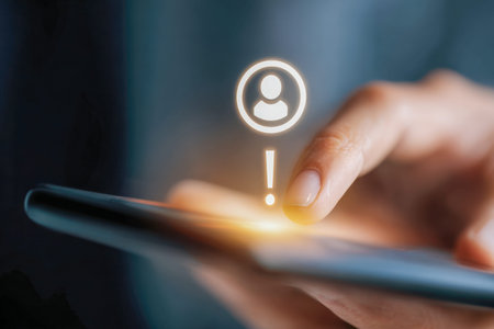 A close-up of a modern smartphone displaying a vibrant notification pop-up, conveying urgency or...