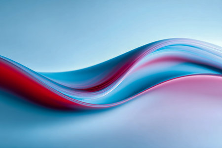 A serene interplay of vibrant blue and warm red hues swirling in gentle, flowing shapes that evoke tranquility and contemporary elegance.の写真素材