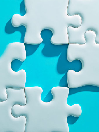 Tangled white fragments cast shadows on a vivid blue surface, suggesting complexity and intrigue in...