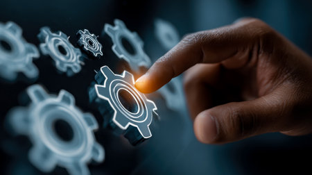 A high-tech visualization featuring interconnected gears overlaid with glowing digital elements, symbolizing seamless technological progress.の写真素材
