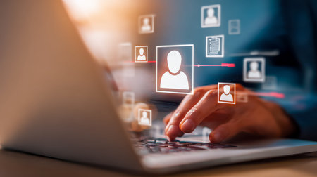 A person engages with vibrant social media icons on their laptop, showcasing digital connectivity...