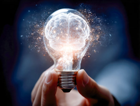 A hand gently cradles an energy-emitting filament, revealing a luminous brain inside, highlighting...
