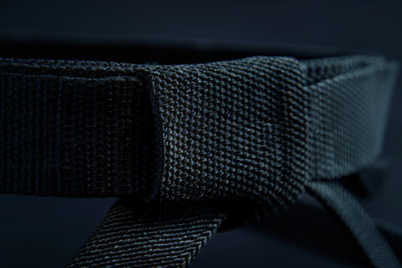 Symbolic black belt. dedication and achievement in summer olympic games sports competitionの写真素材