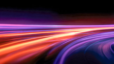 Swirling arcs of luminous hues dance across a shadowed canvas, evoking a sense of rapid motion and cutting-edge innovation through their sleek, flowing curves.の写真素材