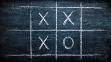 A hand-drawn illustration of a competitive game on a blackboard, with strategic moves by players using chalk in a visually textured and thought-provoking setup.の写真素材