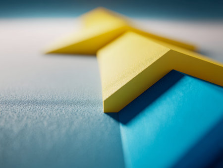 Bold yellow markers rest on a rough surface, their angular shadows creating a sense of motion and...