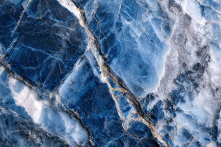 A stunning azure marble surface showcasing delicate white and shimmering gold veins, exuding luxury and sophistication, ideal for upscale interior designs and artistの写真素材