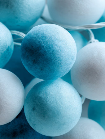 Plush spheres in calming blue and white hues are grouped tightly, evoking serenity and warmth perfect for inspiring tranquil interior decor ideas.の写真素材