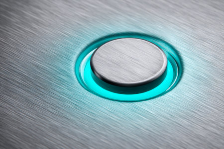 A smooth, reflective steel panel features a central round element gently pulsing with a calming turquoise glow, evoking a cutting-edge, sci-fi ambiance.の写真素材