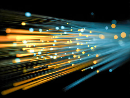 Dynamic ribbons of fiery orange and electric blue pulse through the darkness, illustrating rapid digital flow and envisioning cutting-edge technological advances.の写真素材