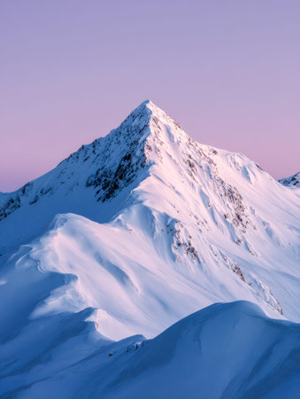 A towering alpine summit blanketed in pristine snow, illuminated by gentle pink hues at dusk, with...
