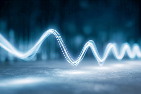 Vibrant neon streams form a rhythmic wave pattern amid a high-tech, abstract blue backdrop, evoking a sense of futuristic energy flow and digital innovation.の写真素材